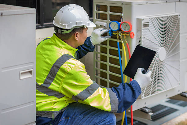Professional Heat Pump Repair technician working in Lockport, IL